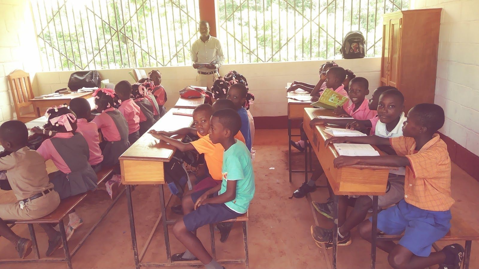 St. Rose School in Pestel, 2nd Grade, pre-COVID19. Because of such a positive response from the community, this school swelled from just 20 students in two grades to 83 students in four grades in just a few years!